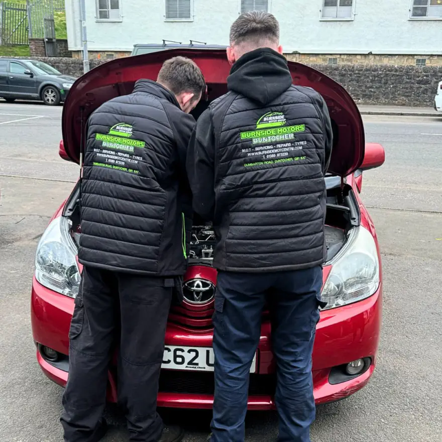 Burnside Motors technicians diagnosing a fault under the bonnet in Duntocher