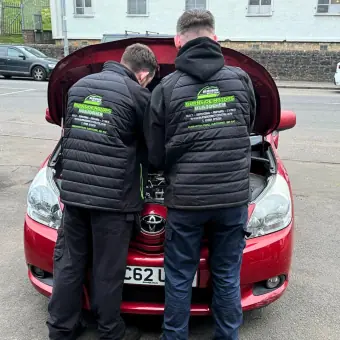 Burnside Motors mechanics diagnosing a fault under the bonnet