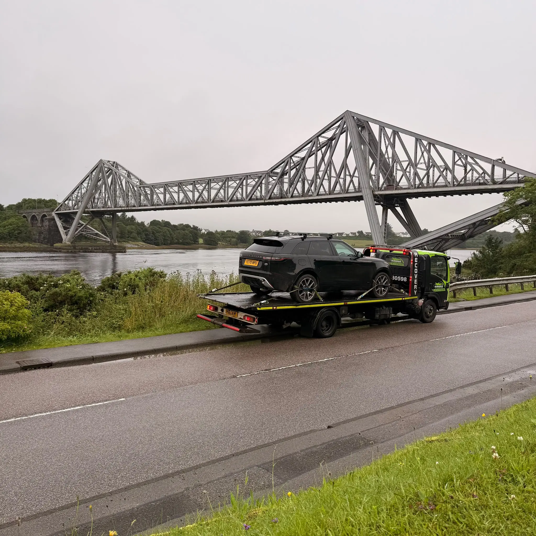 Burnside recovery transporting a vehicle across the west of Scotland